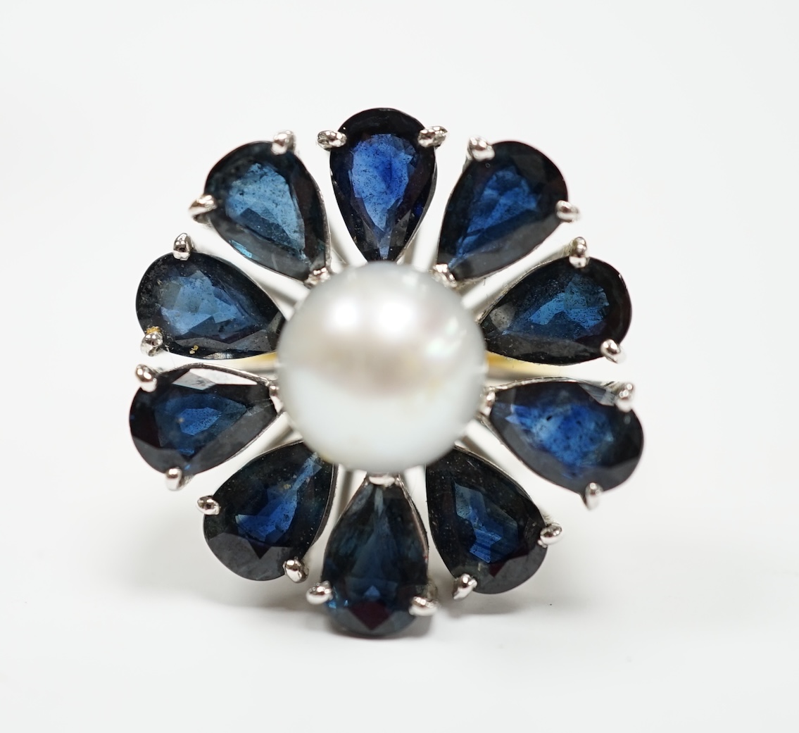 A modern large 18ct gold, single stone cultured pearl and ten stone pear cut sapphire set flower head cluster ring, size G, gross weight 15.4 grams.